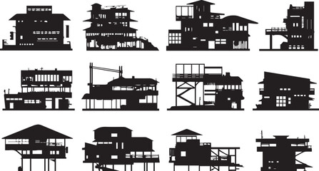 Fototapeta premium A set of houses silhouettes for flat design. Hand drawn vector illustration