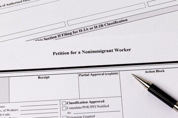 Nonimmigrant worker visa application documents. H-2A temporary agriculture worker, foreign worker farmworker shortage concept. 