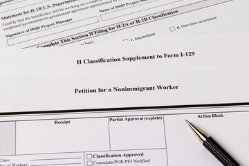 Obraz premium Nonimmigrant worker visa application documents. H-2A temporary agriculture worker, foreign worker farmworker shortage concept. 