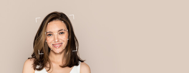 A smiling young woman is featured with facial recognition markers overlayed. The background is...