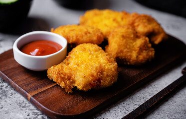 Crispy chicken nuggets with sauce