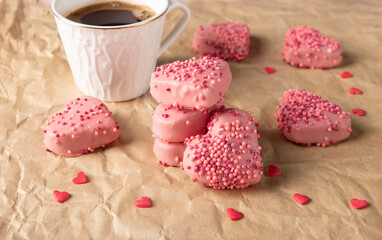 Cookies in shape of hearts, covered with pink glaze