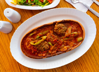 Izmir kofte, turkish dish of spicy meatballs served in tomato sauce