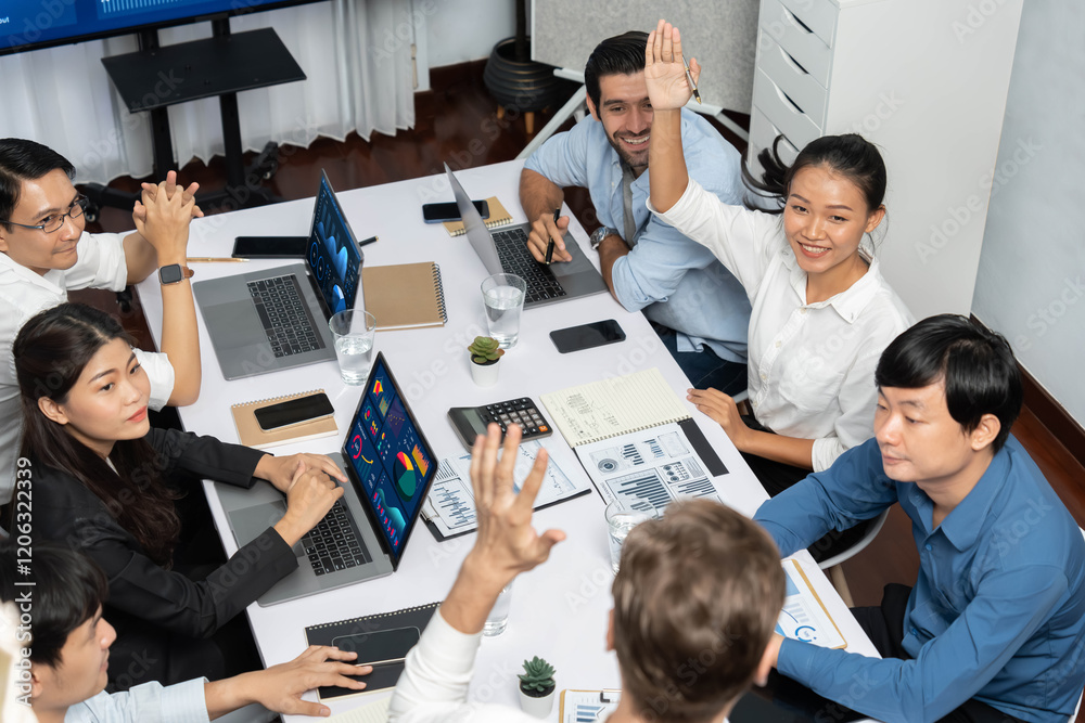 Leinwandbilder Office worker raise hand up asking for question during business meeting on data analysis using BI or business intelligence software for marketing and strategic planning. Prudent