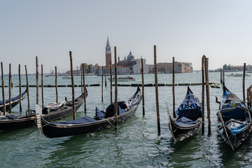 Fototapeta premium Gondolas. Gondolas parked on the canal without people.