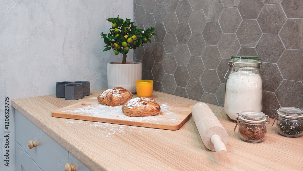 Poster a wooden cutting board with two loaves of bread on it and a rolling pin. a potted plant is on the co