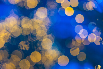 Out of focus christmas lights in blue evening light.