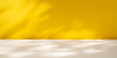 Yellow minimalist background with soft, natural shadows.	
