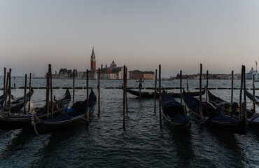 Gondolas. Gondolas parked on the canal without people.