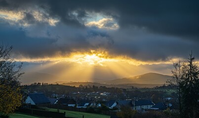 Evening sky with sun peeking through clouds