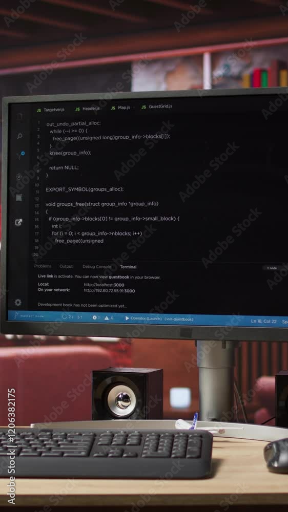 Fototapete Vertical video UI on computer monitor in home office with programming script being executed. Empty modern apartment room with coding application used by remote employee to write code, jib up shot