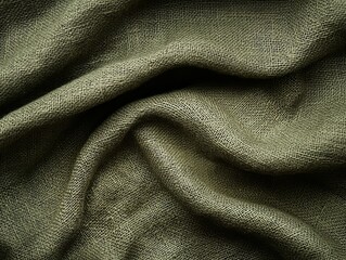 Textured olive green fabric background