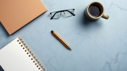 Flatlay of workspace essentials: notebook, pen, glasses, and coffee. Minimalist and organized desk setup, perfect for productivity.