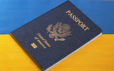 S passport against the background of the Ukrainian flag