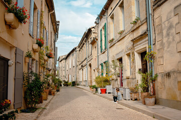 A stunning photo of a historic European village. Cobblestone streets and vintage architecture highlight the charm of France or Switzerland. Perfect for travel and tourism content