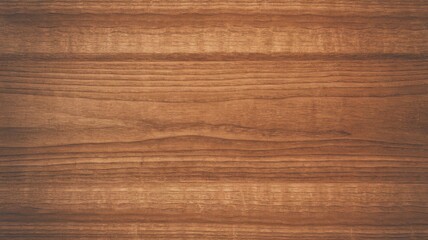 A close-up view of polished wooden texture, showcasing rich brown tones and natural grain patterns.
