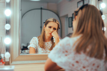 Sad Unhappy Bride Crying in a Make-up Mirror
Woman suffering from anxiety before her wedding...