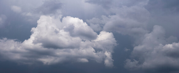 A breathtakingly Dramatic Cloudy Sky adorned with Stunning Shades of Gray and Light