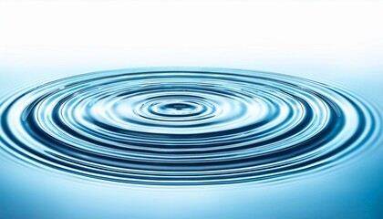 Circular ripples in clear blue water.