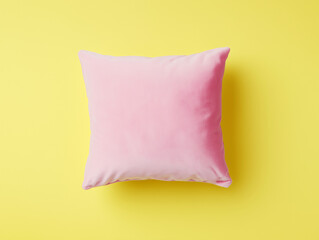 pink pillow on yellow background