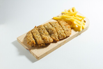 Homemade Japanese Chicken Katsu, featuring crispy breaded chicken, served alongside golden French fries. A delicious fusion meal perfect for food photography, recipe inspiration, or culinary promot