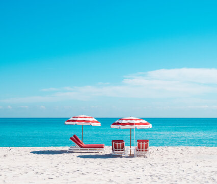 beach umbrella and lounge chair in miami florida