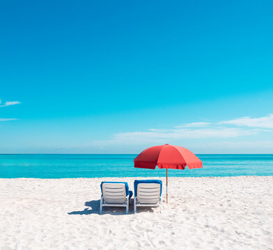 beach umbrella and lounge chair in miami florida