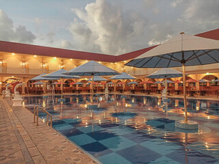 Hotel with swimming pool and warm lights