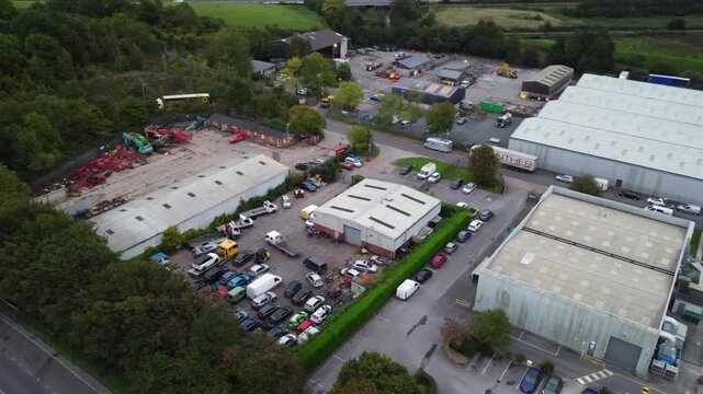 Dunball Bridgewater Industrial Estate Near Countryside and River, South west of England United Kingdom. Drone's Camera footage Was Captured During Cloudy Morning on October 2nd, 2024.