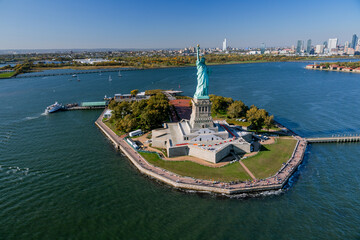 Aerial View of the Statue of Liberty and Liberty Island with New York Harbor in New York City  © Ilana