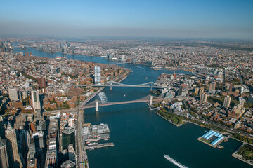 Naklejka premium Aerial View of Brooklyn Bridge and Manhattan Bridge Spanning the East River in New York City