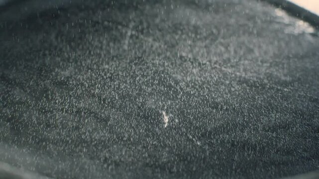 Small Wilson cloud chamber in action with visible particle tracks