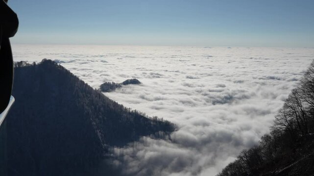 Amazing cloud formations over Gebele city, surrounded by the Caucasus Mountains in early winter evening. Azerbaijan