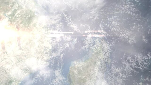Earth zoom in from space and focus on Mamoudzou, Mayotte. Background for travel blog or intro. Satellite view. 3D style animation. Images from NASA.