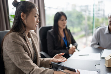 Business people signing contract making deal with real estate agent Concept for consultant home insurance Real estate investment Property insurance security. Real estate agent.