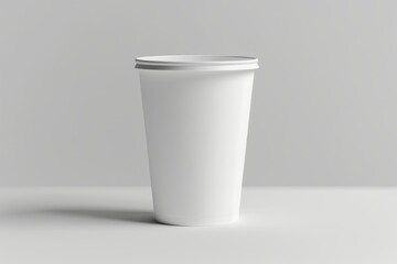 Blank white disposable paper cup on white background. (2)