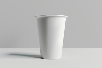 Blank white disposable paper cup on white background. (5)