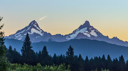 Twin volcanic peaks at sunset, forested foreground, meteor trail.  Landscapes photography
