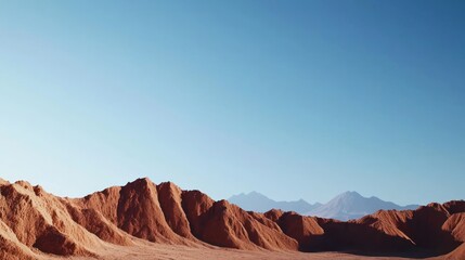 Naklejka premium Red Desert Mountains under a Clear Sky