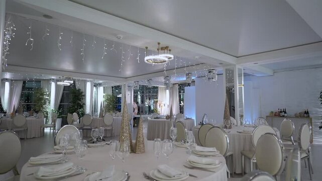 This contemporary event venue showcases sophisticated decor along with elegant seating arrangements that truly impress