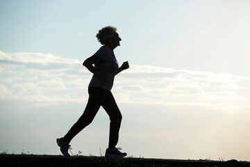 Elderly woman jogging in the evening. Healthy lifestyle at old age
