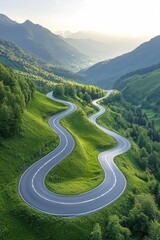 Fototapeta premium Winding Mountain Road Scenic Drive Through Lush Green Valley