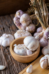 Garlic on a wooden floor background