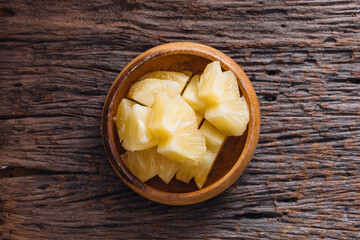 pineapple on wooden background