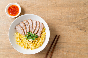 dried duck noodles in white bowl
