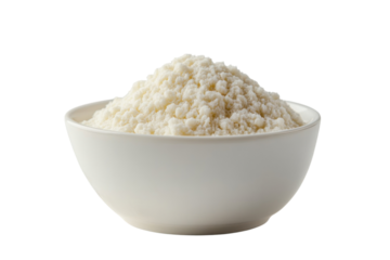Bowl of fine white flour ready for baking in a cozy kitchen environment during the day