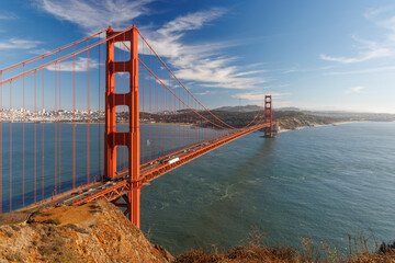 Iconic view of the Golden Gate Bridge bathed in warm sunlight
