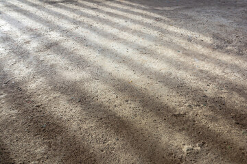 Sunlight and Shadows on Textured Concrete Construction