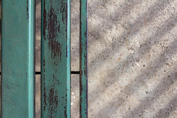 Metal with Abstract Sunlight Shadows on Rough Concrete Surface