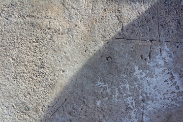 Abstract Sunlight Shadows on Rough Concrete Surface